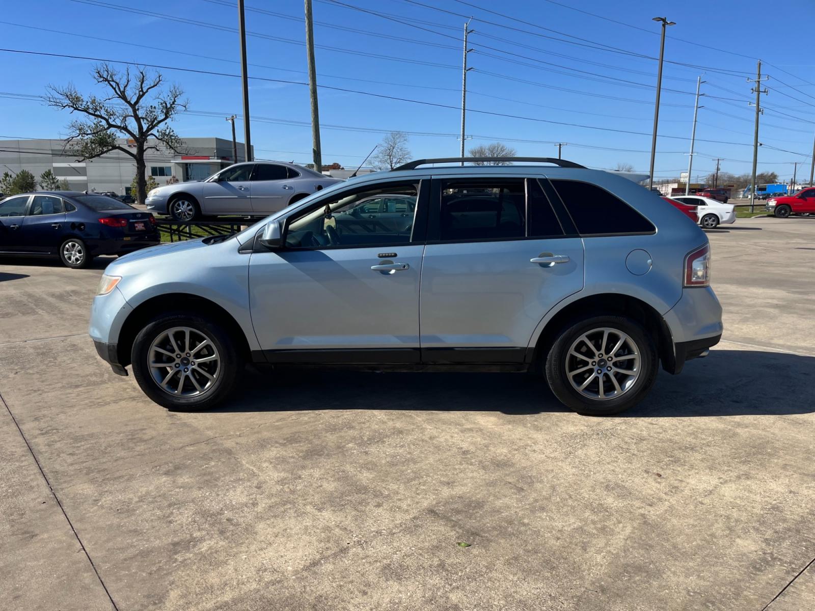 2008 blue /black Ford Edge SEL FWD (2FMDK38C98B) with an 3.5L V6 DOHC 24V engine, 6-Speed Automatic Overdrive transmission, located at 14700 Tomball Parkway 249, Houston, TX, 77086, (281) 444-2200, 29.928619, -95.504074 - Photo #3